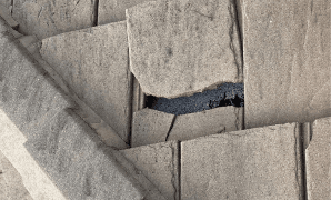 Damage to a shingle roof